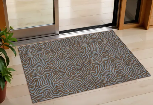 3' X 5' Brown And Light Blue Abstract Washable Indoor Outdoor Area Rug