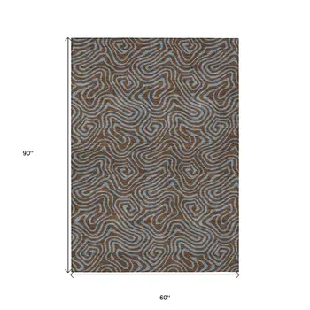 5' X 8' Brown And Light Blue Abstract Washable Indoor Outdoor Area Rug