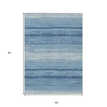 5' X 8' Blue And Ivory Abstract Washable Indoor Outdoor Area Rug