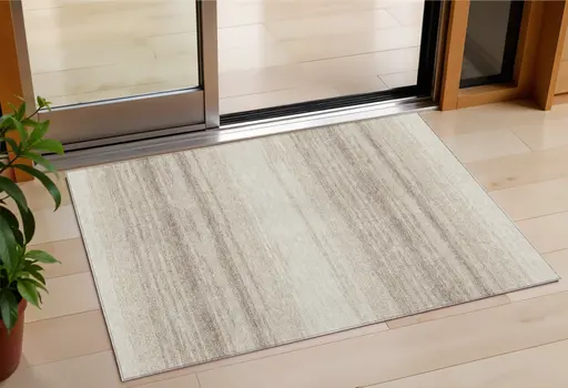 3' X 5' Ivory And Beige Abstract Washable Indoor Outdoor Area Rug