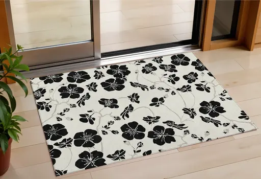 3' X 5' Ivory And Black Floral Washable Indoor Outdoor Area Rug