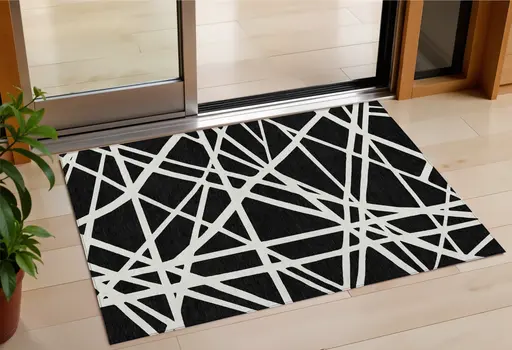 3' X 5' Black And Ivory Geometric Washable Indoor Outdoor Area Rug