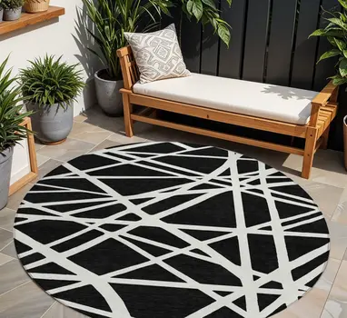 8' Black And Ivory Round Geometric Washable Indoor Outdoor Area Rug
