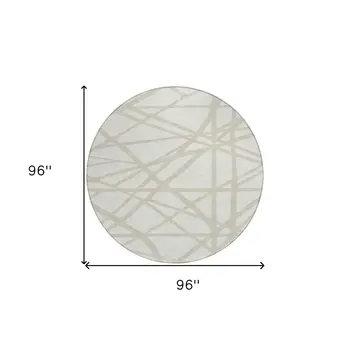 8' Ivory And Beige Round Geometric Washable Indoor Outdoor Area Rug