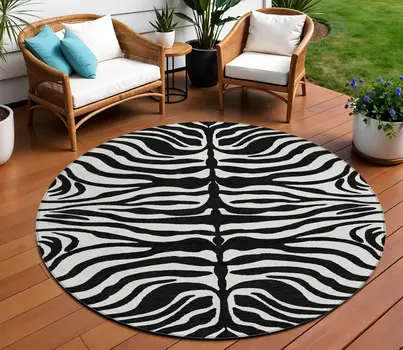 8' Black And Ivory Round Animal Print Washable Indoor Outdoor Area Rug