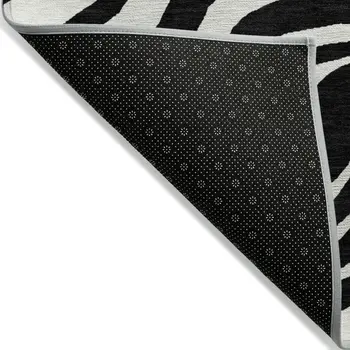9' X 12' Black And Ivory Animal Print Washable Indoor Outdoor Area Rug