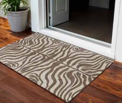 3' X 5' Brown And Beige Animal Print Washable Indoor Outdoor Area Rug