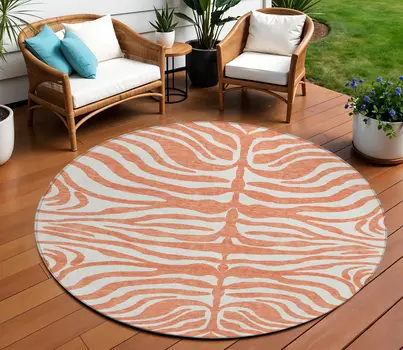 8' Coral And Ivory Round Animal Print Washable Indoor Outdoor Area Rug