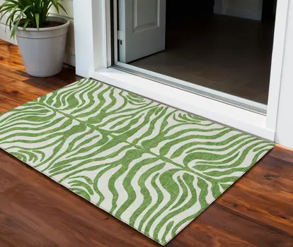 3' X 5' Green And Ivory Animal Print Washable Indoor Outdoor Area Rug