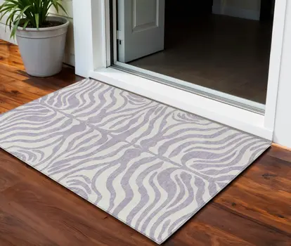 3' X 5' Lavender And Ivory Animal Print Washable Indoor Outdoor Area Rug