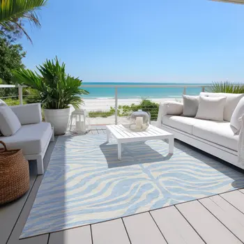 10' X 14' Sky Blue And Ivory Animal Print Washable Indoor Outdoor Area Rug