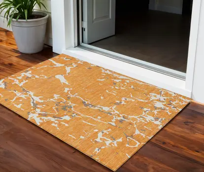 3' X 5' Orange Brown And Ivory Striped Washable Indoor Outdoor Area Rug