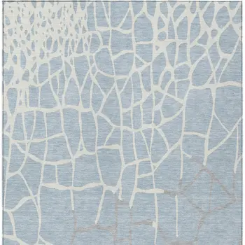5' X 8' Sky Blue And Ivory Abstract Washable Indoor Outdoor Area Rug