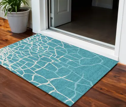 3' X 5' Teal Blue And Ivory Abstract Washable Indoor Outdoor Area Rug