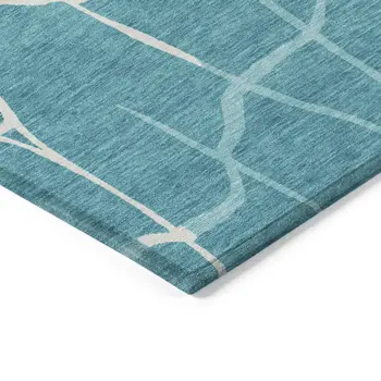 9' X 12' Teal Blue And Ivory Abstract Washable Indoor Outdoor Area Rug