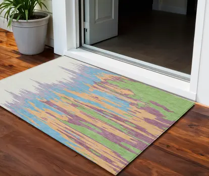 3' X 5' Peach Purple And Green Abstract Washable Indoor Outdoor Area Rug