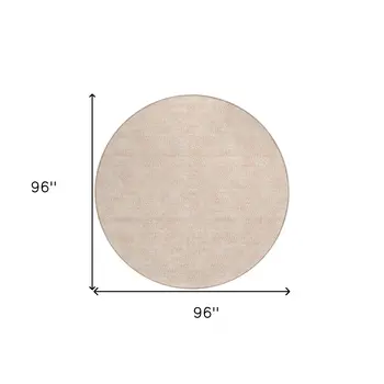8' Peach And Beige Round Geometric Washable Indoor Outdoor Area Rug