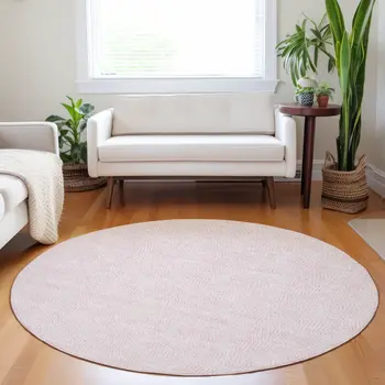 8' Pink And Ivory Round Geometric Washable Indoor Outdoor Area Rug