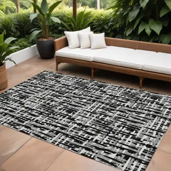 10' X 14' Black Gray And Ivory Abstract Washable Indoor Outdoor Area Rug