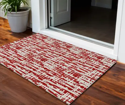 3' X 5' Red And Ivory Abstract Washable Indoor Outdoor Area Rug