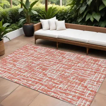 9' X 12' Coral Pink And Ivory Abstract Washable Indoor Outdoor Area Rug