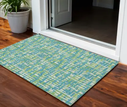 3' X 5' Turquoise Green And Ivory Abstract Washable Indoor Outdoor Area Rug