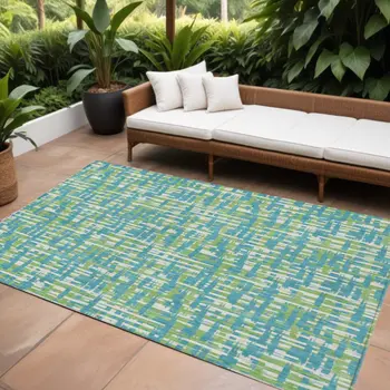 8' X 10' Turquoise Green And Ivory Abstract Washable Indoor Outdoor Area Rug