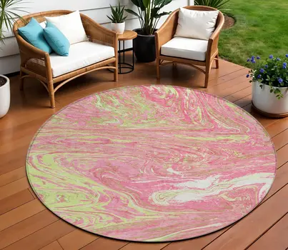 8' Pink Green And Ivory Round Abstract Washable Indoor Outdoor Area Rug