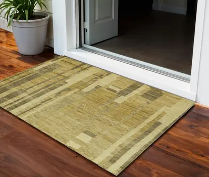 3' X 5' Gold And Dark Brown Striped Washable Indoor Outdoor Area Rug