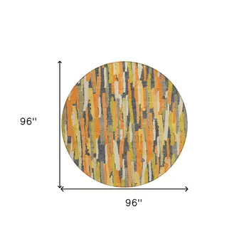 8' Orange And Beige Round Striped Washable Indoor Outdoor Area Rug