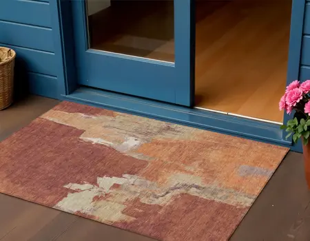 3' X 5' Orange And Burnt Orange Abstract Washable Indoor Outdoor Area Rug