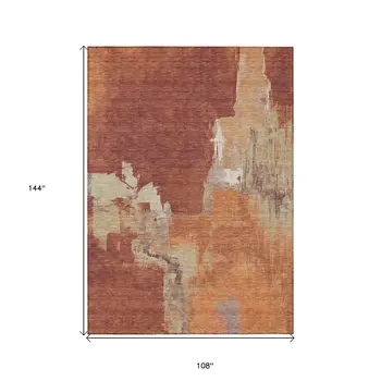 9' X 12' Orange And Burnt Orange Abstract Washable Indoor Outdoor Area Rug