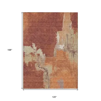 10' X 14' Orange And Burnt Orange Abstract Washable Indoor Outdoor Area Rug