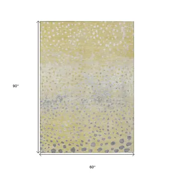 5' X 8' Gold And Wheat Abstract Washable Indoor Outdoor Area Rug