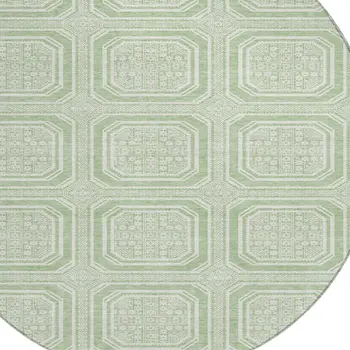 8' Mint Green And Ivory Round Geometric Washable Indoor Outdoor Area Rug