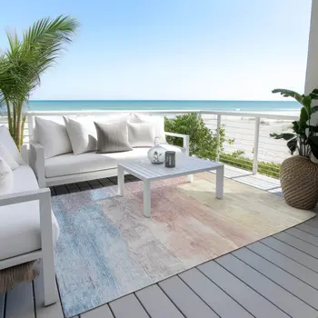 5' X 8' Beige And Salmon Abstract Washable Indoor Outdoor Area Rug