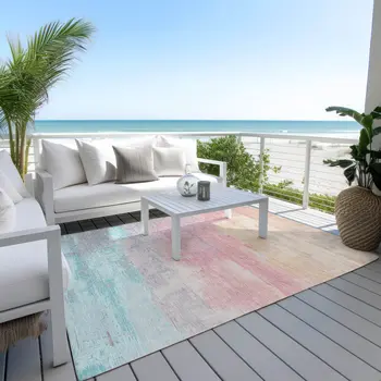 10' X 14' Salmon And Beige Abstract Washable Indoor Outdoor Area Rug