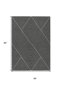 5' X 8' Black And Ivory Geometric Washable Indoor Outdoor Area Rug