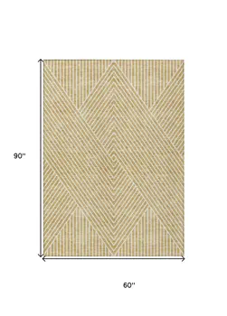 5' X 8' Gold And Ivory Geometric Washable Indoor Outdoor Area Rug