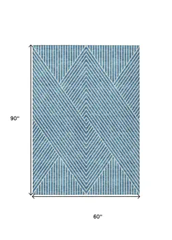 5' X 8' Teal Blue And Ivory Geometric Washable Indoor Outdoor Area Rug