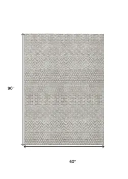 5' X 8' Beige And Ivory Chevron Washable Indoor Outdoor Area Rug