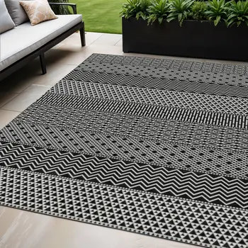 5' X 8' Black And Ivory Chevron Washable Indoor Outdoor Area Rug