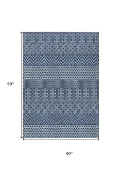 5' X 8' Navy Blue And Ivory Chevron Washable Indoor Outdoor Area Rug