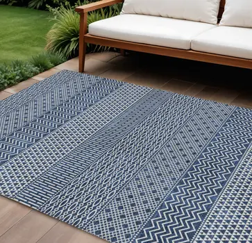 9' X 12' Navy Blue And Ivory Chevron Washable Indoor Outdoor Area Rug