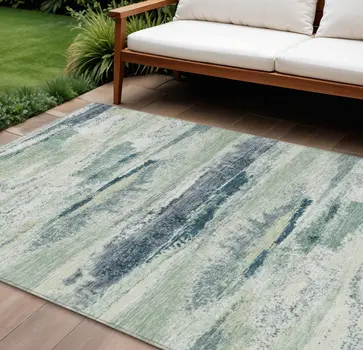 9' X 12' Mint Green Ivory And Denim Blue Abstract Washable Indoor Outdoor Area Rug