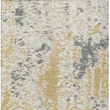 3' X 5' Gold And Ivory Abstract Washable Indoor Outdoor Area Rug