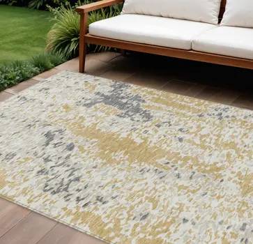 10' X 14' Gold And Ivory Abstract Washable Indoor Outdoor Area Rug