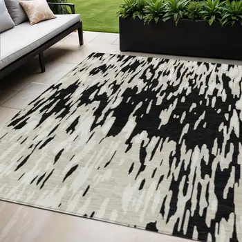 5' X 8' Black And Ivory Abstract Washable Indoor Outdoor Area Rug