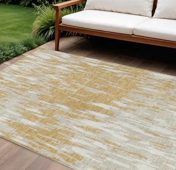 10' X 14' Gold And Ivory Abstract Washable Indoor Outdoor Area Rug