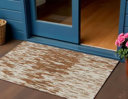 3' X 5' Orange And Ivory Abstract Washable Indoor Outdoor Area Rug